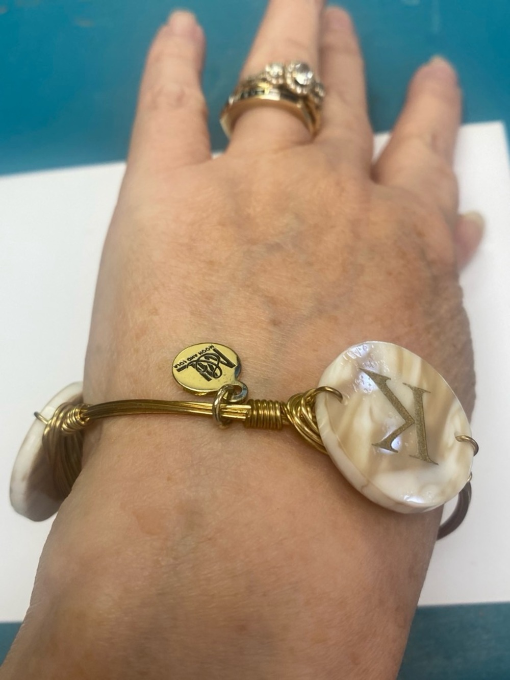 Gold-Tone Bangle Bracelet with Ivory Marbled Monogram Discs